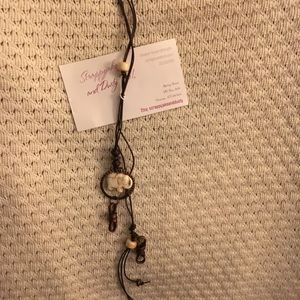 Eloquent elephant boho style necklace leather cord